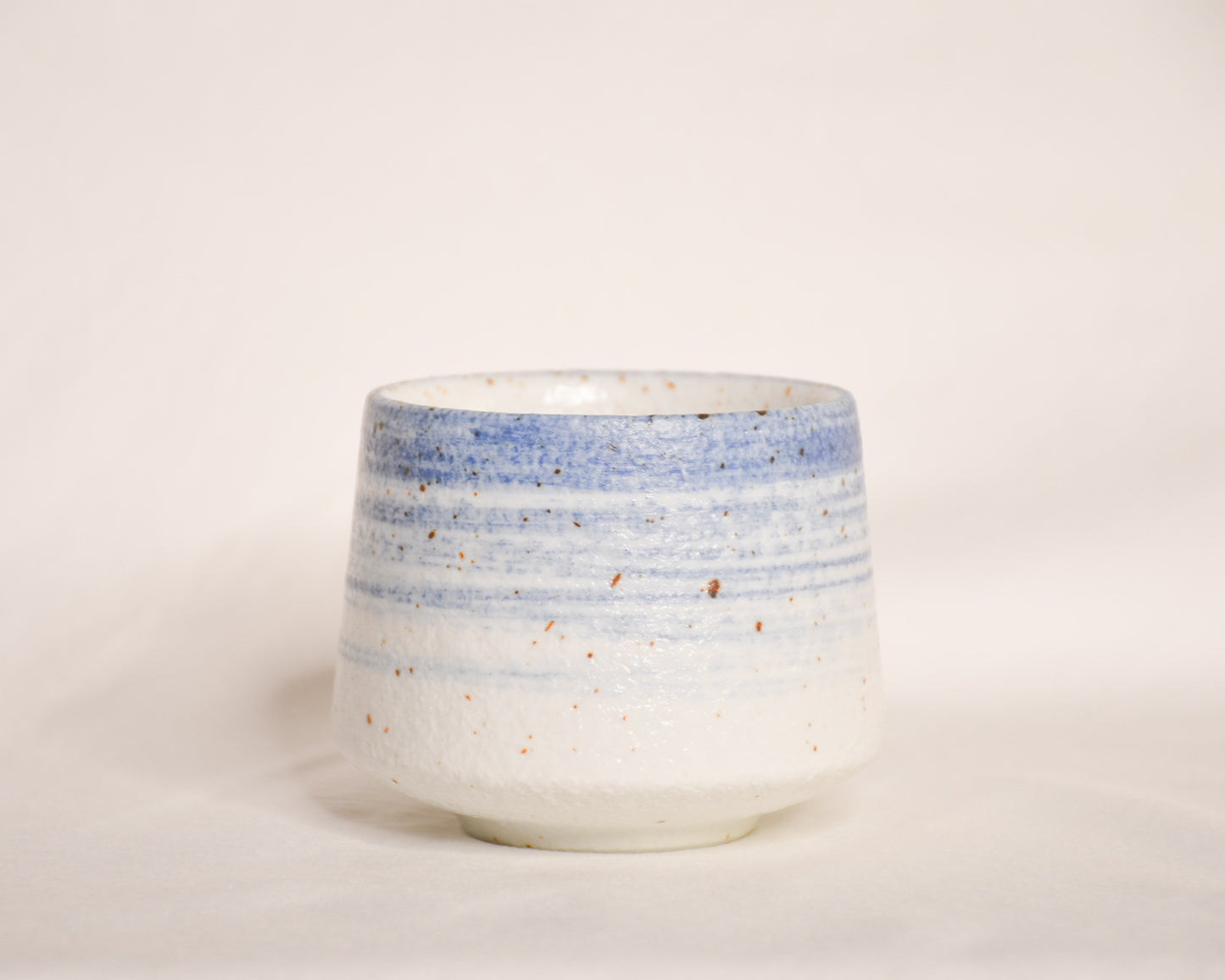 BRUSHED AWAY IN BLUE PORCELAIN CUP